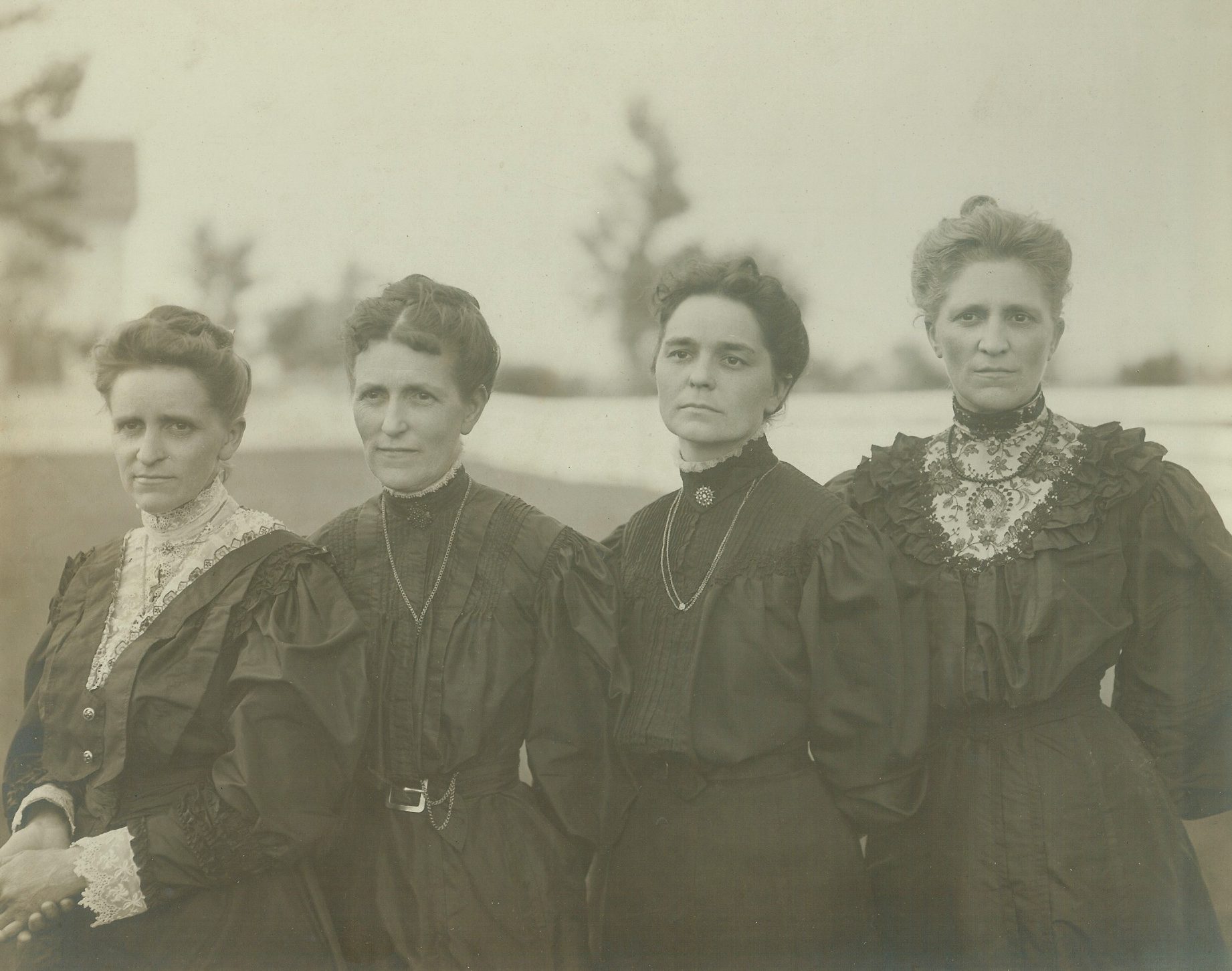 Edwardian-era women standing together