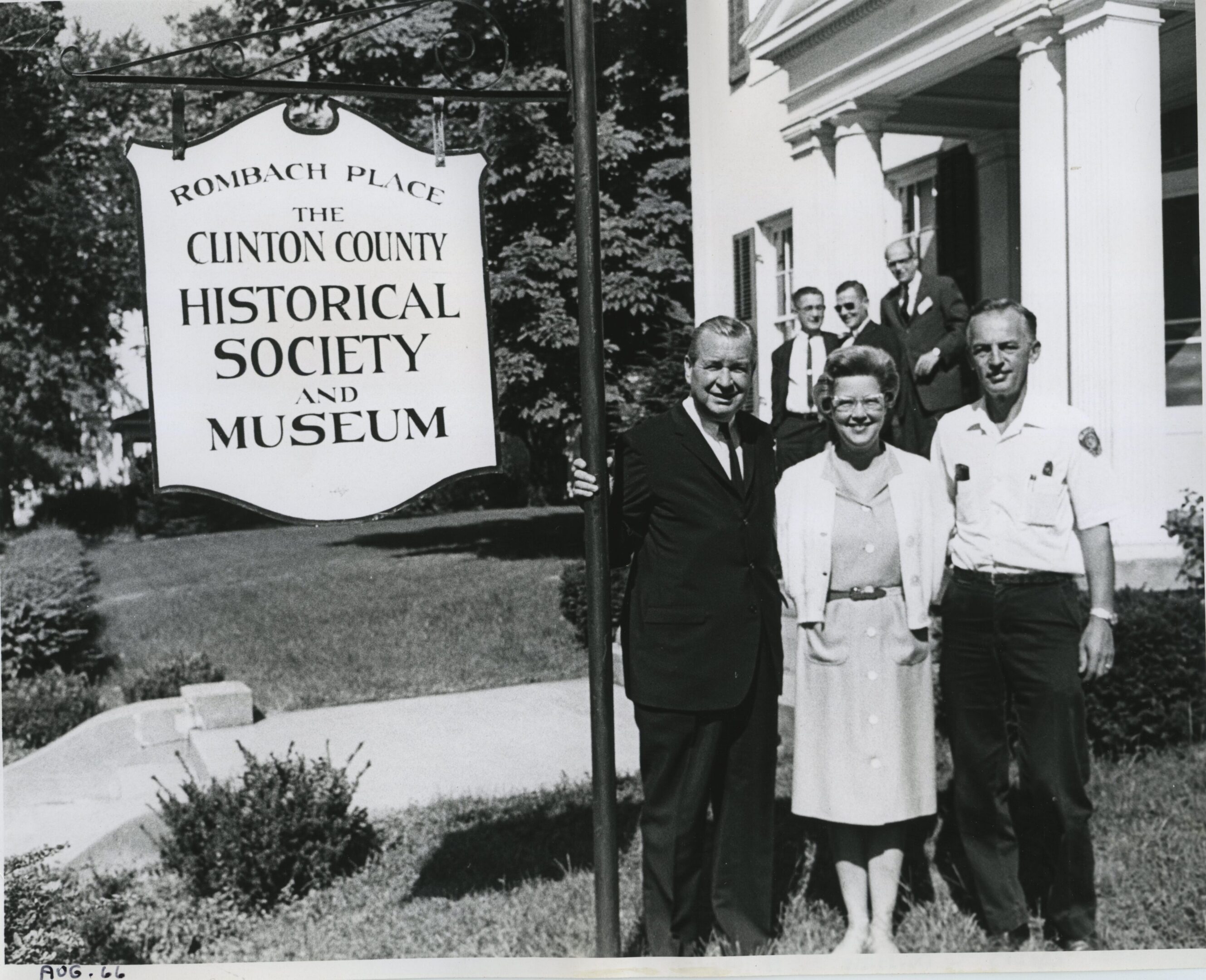 Historical society members outside museum building