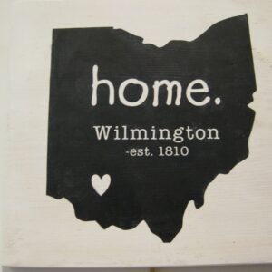 Silhouette of Ohio with "home. Wilmington est. 1810" text and a heart symbol.