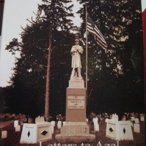 Statue of a soldier at a memorial site with flags and wreaths.